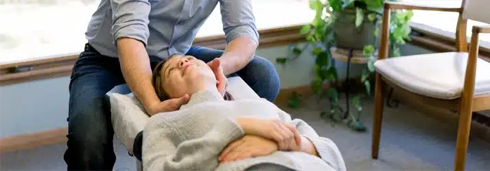 Chiropractor Watertown WI Joel Kirchberg Adjusting A Patient